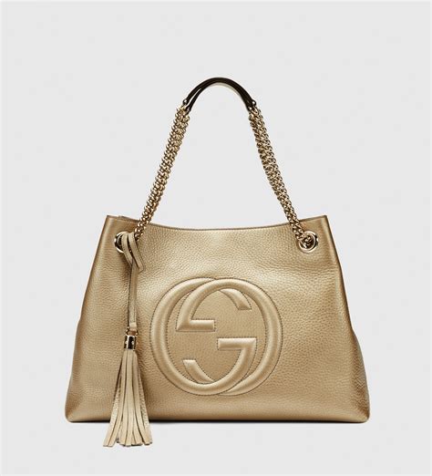 gucci metallic leather &|Gucci leather tote bag.